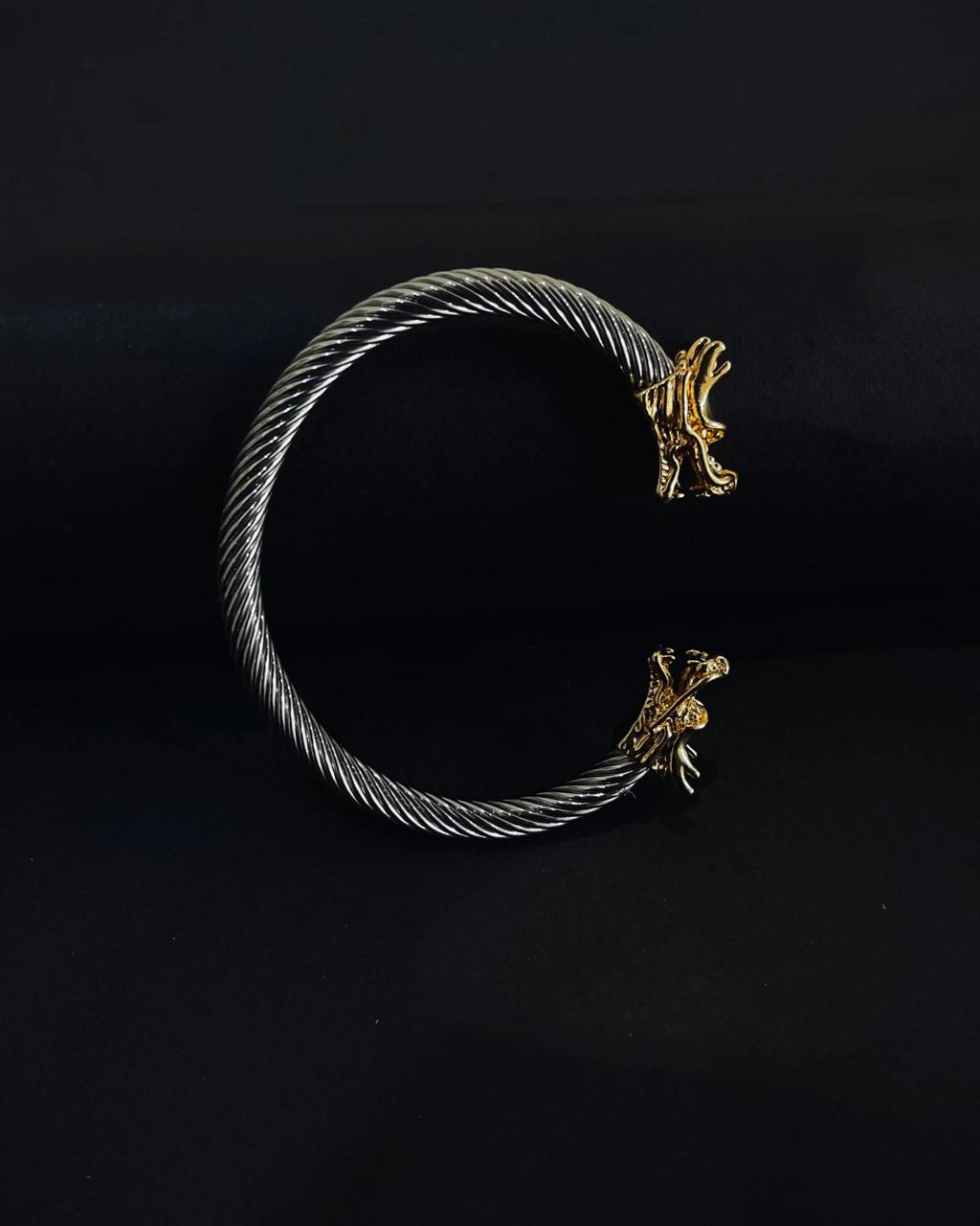 Dual Tone Steel Cable Cuff Bracelet with Gold Lion Heads